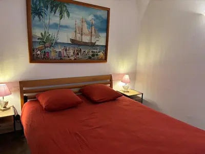 Un ou plusieurs lits dans un hébergement de l'établissement Appartement Spacieux Vue Montagne- Parking gratuit- Proche ÎLE ROUSSE