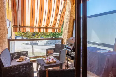Un ou plusieurs lits dans un hébergement de l'établissement Casa Santa Lucia - Climatisé au bord de Mer