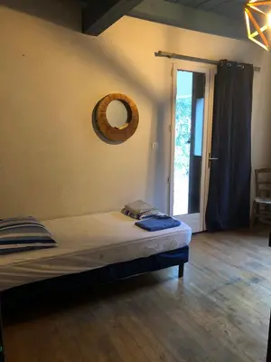 Un ou plusieurs lits dans un hébergement de l'établissement Maison de caractère