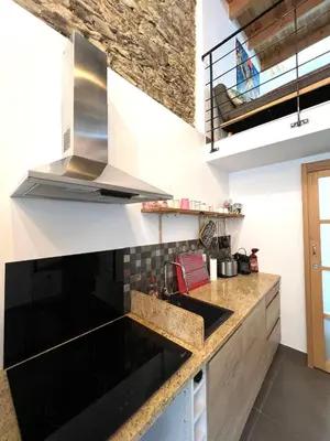Cuisine ou kitchenette dans l'établissement Maison de village