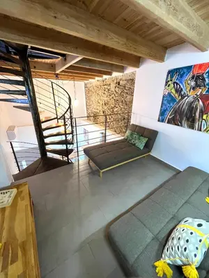 Coin salon dans l'établissement Maison de village