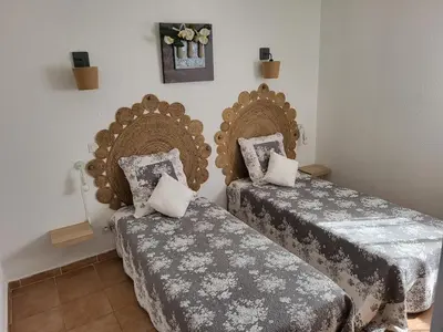 Un ou plusieurs lits dans un hébergement de l'établissement Charmant appartement St Florent