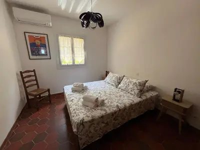 Un ou plusieurs lits dans un hébergement de l'établissement Villa À Chjusella Santa Reparata di Balagna à 5kms des plages