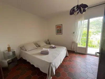 Un ou plusieurs lits dans un hébergement de l'établissement Villa À Chjusella Santa Reparata di Balagna à 5kms des plages