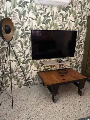 Télévision ou salle de divertissement dans l'établissement Bella Suare