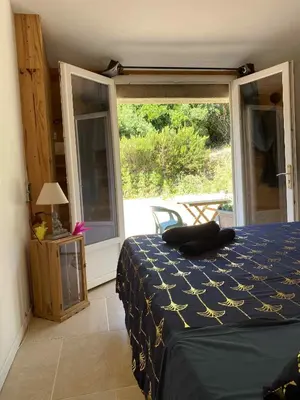 Un ou plusieurs lits dans un hébergement de l'établissement Chambre d'Hôtes Chez Tania et Benoit