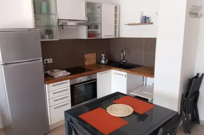 Cuisine ou kitchenette dans l'établissement T2 BASTIA vue panoramique mer montagne