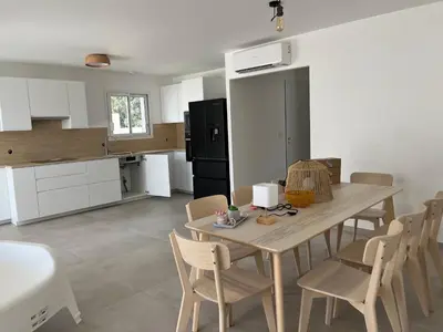 Cuisine ou kitchenette dans l'établissement Villa L et Villa J