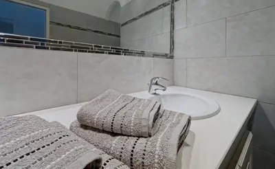 Salle de bains dans l'établissement La Parenthèse Corse