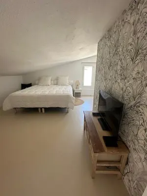 Un ou plusieurs lits dans un hébergement de l'établissement La Villa des Sables Borgu