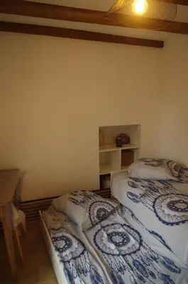Un ou plusieurs lits dans un hébergement de l'établissement Typical Corsican apartment