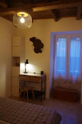 Un ou plusieurs lits dans un hébergement de l'établissement Typical Corsican apartment