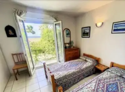 Un ou plusieurs lits dans un hébergement de l'établissement Sant'Ambroggio - Marina de LUMIO - bord de Mer Corse