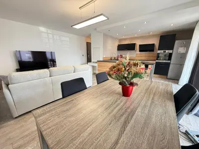 Cuisine ou kitchenette dans l'établissement Confortable T3 10 min plage