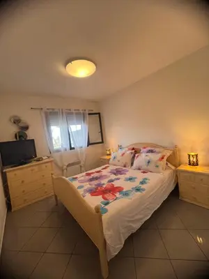 Un ou plusieurs lits dans un hébergement de l'établissement CORSE RESIDENCE COSTA D'ORO Folelli F3