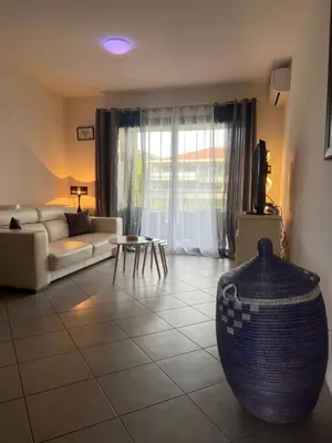 Coin salon dans l'établissement CORSE RESIDENCE COSTA D'ORO Folelli F3