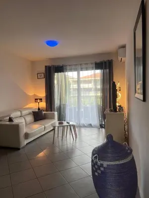 Coin salon dans l'établissement CORSE RESIDENCE COSTA D'ORO Folelli F3