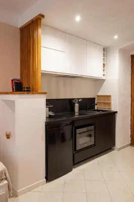 Cuisine ou kitchenette dans l'établissement Cocon douillet au coeur de Bastia