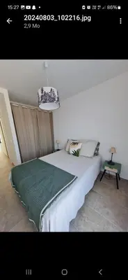 Un ou plusieurs lits dans un hébergement de l'établissement charmante maison neuve proche plage et commerces