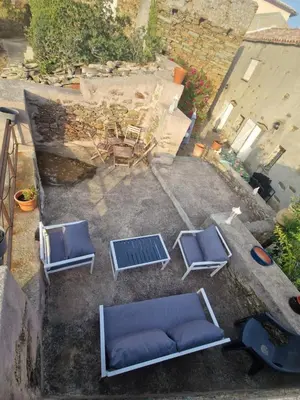 Coin salon dans l'établissement Maison authentique au cœur du village de Méria