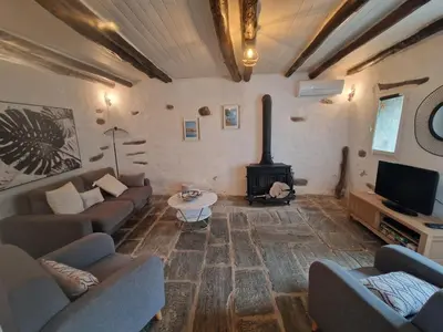 Coin salon dans l'établissement Maison authentique au cœur du village de Méria