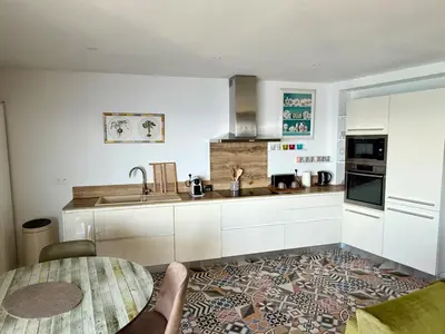 Cuisine ou kitchenette dans l'établissement Grand appartement Prestige sur la mer