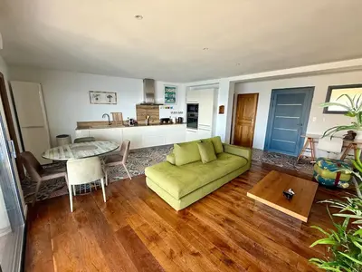 Coin salon dans l'établissement Grand appartement Prestige sur la mer