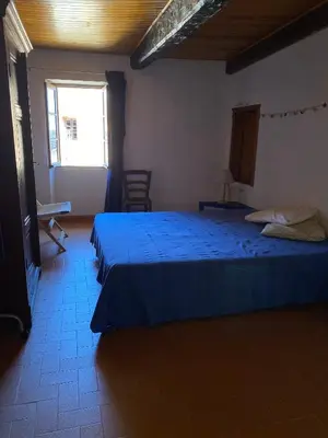 Un ou plusieurs lits dans un hébergement de l'établissement Casa Padume - Maison de village en Balagne