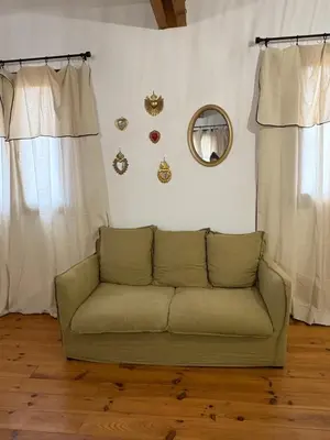 Coin salon dans l'établissement Ferme auberge U sapè fà