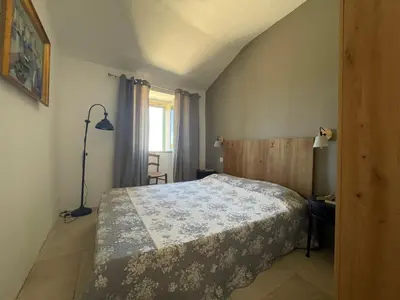 Un ou plusieurs lits dans un hébergement de l'établissement Maison authentique de 4 à 10 personnes