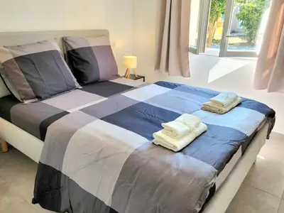 Un ou plusieurs lits dans un hébergement de l'établissement Villa Poggiole