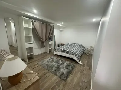 Un ou plusieurs lits dans un hébergement de l'établissement Appartement proche de la rivière et de la plage !