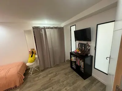 Télévision ou salle de divertissement dans l'établissement Appartement proche de la rivière et de la plage !