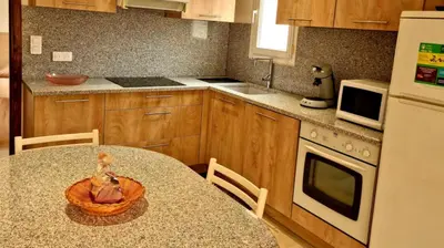 Cuisine ou kitchenette dans l'établissement DelpinoLocations