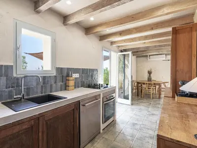 Cuisine ou kitchenette dans l'établissement Holiday Home Casa Murato by Interhome