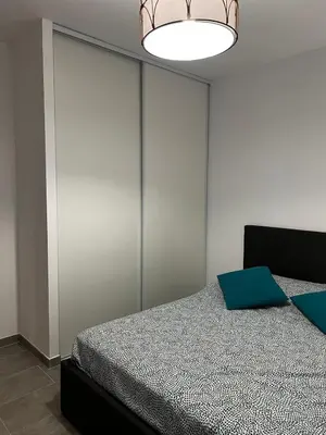 Un ou plusieurs lits dans un hébergement de l'établissement Appartement T2 neuf résidence U Scalu