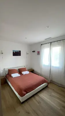 Un ou plusieurs lits dans un hébergement de l'établissement Villa 4 chambres à Castirla