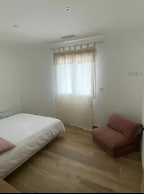 Un ou plusieurs lits dans un hébergement de l'établissement Villa 4 chambres à Castirla