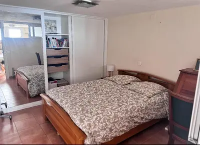 Un ou plusieurs lits dans un hébergement de l'établissement Appartement Elba