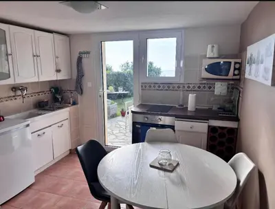 Cuisine ou kitchenette dans l'établissement Appartement Elba