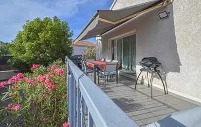 Balcon ou terrasse dans l'établissement Villa Moderne Plage À Pieds