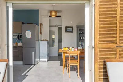 Cuisine ou kitchenette dans l'établissement L'Ortu - maison charmante vue mer - Erbalunga