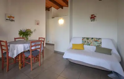 Coin salon dans l'établissement Appartement Residence Piscine