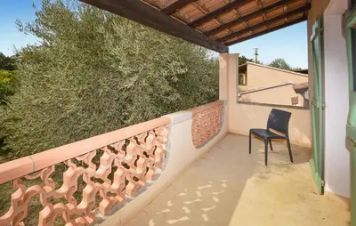 Balcon ou terrasse dans l'établissement Maison Residence Piscine