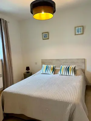Un ou plusieurs lits dans un hébergement de l'établissement appartement au coeur de Saint-Florent à 200m de la plage