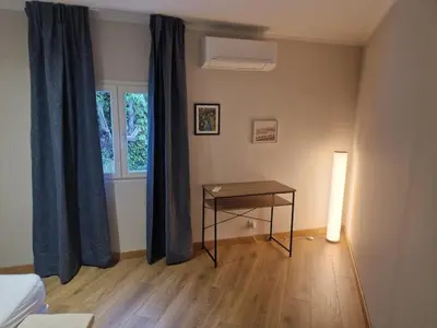 Coin salon dans l'établissement appartement vezzani