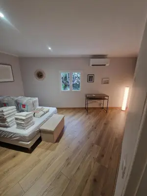 Coin salon dans l'établissement appartement vezzani