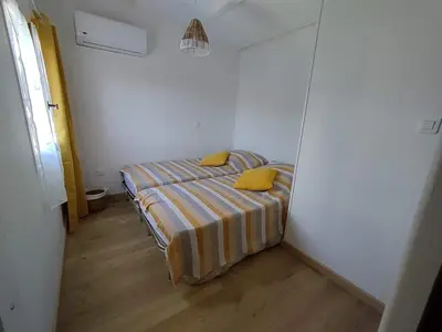 Un ou plusieurs lits dans un hébergement de l'établissement Villa bord de mer Résidence Alba Serena