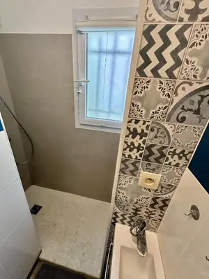 Salle de bains dans l'établissement Appartement face à la mer