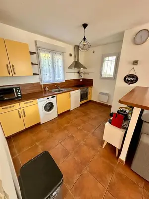 Cuisine ou kitchenette dans l'établissement Appartement face à la mer